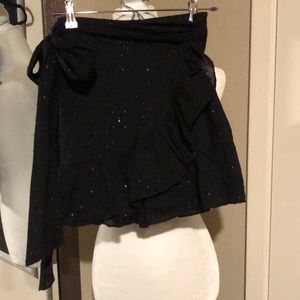 Black skirt with subtle sparkles.